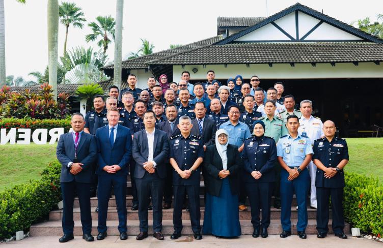 Workshop participants stand for group shot